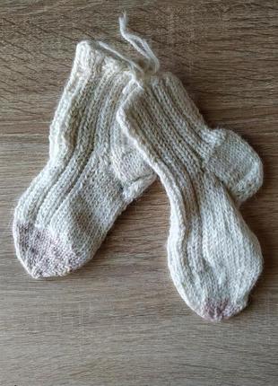 Вязаные носки на девочку1 фото