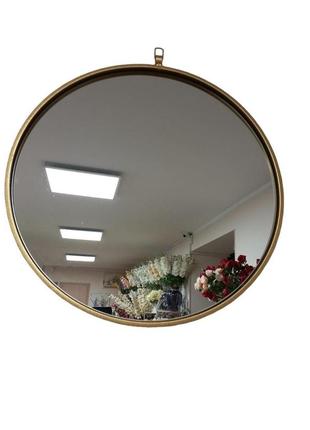 Дзеркало настінне кругле в золотій рамі, метал1 фото