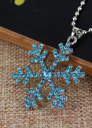 Кулон на цепочке, голубая снежинка принцесси эльзы3 фото
