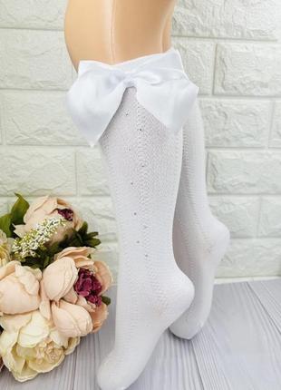 Підколінники білі з бантиком та камінцями для дівчинки у школу турецькі