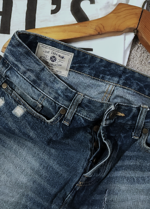 Модні рвані джинси3 фото