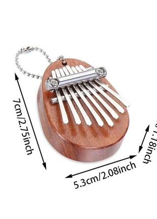 Дерев'яна міні калімба 8-ми клавішна з цифрами mini kalimba 8 key3 фото