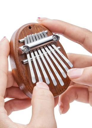 Дерев'яна міні калімба 8-ми клавішна з цифрами mini kalimba 8 key7 фото