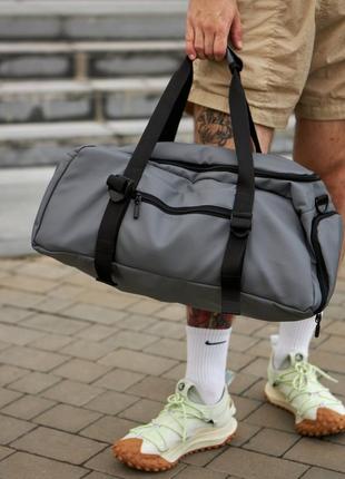 Cпортивна сумка через плече на 30л в сірому кольорі