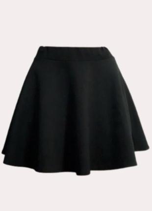 Однотонна чорна шкільна юбка в складку на гумці базова плісирована спідниця шкільна форма