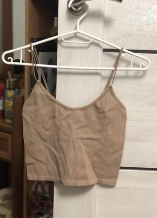 Бежевий топ у рубчик