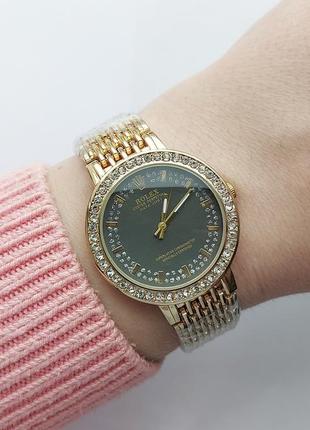 Наручний годинник жіночий в золотому кольорі1 фото