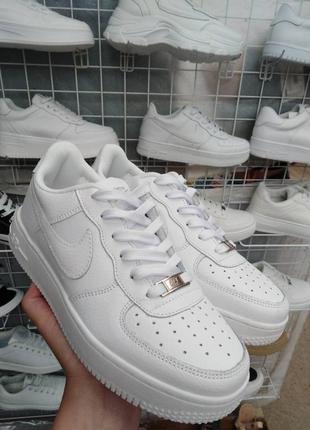 Кроссовки кожаные белые nike air force2 фото