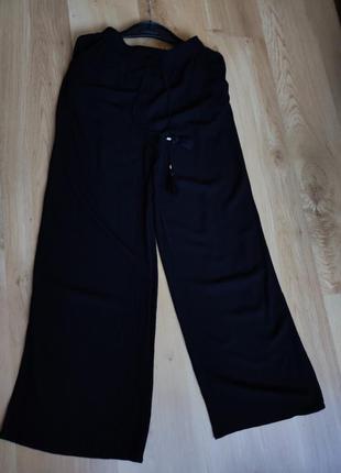 Черные брюки брючины палаццо жатка м-л2 фото