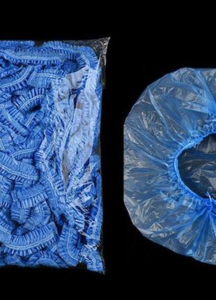 Полиэтиленовая одноразовая шапочка универсальная с резинкой синяя1 фото