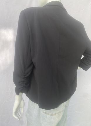 Черный классический пиджак с красивым укороченным рукавом10 фото