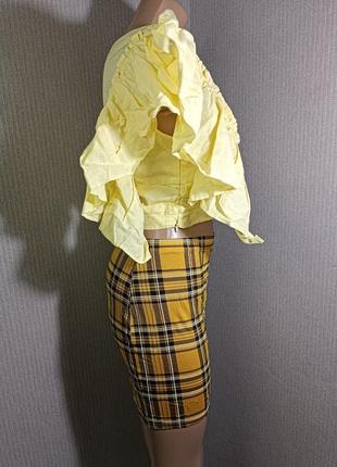 Комплект блуза -топ и юбка в желтых цветах2 фото
