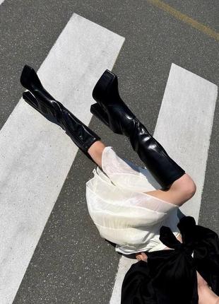 Сапоги с узким носком на высоком каблуке кожаные в черном цвете5 фото