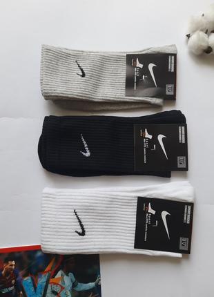 Шкарпетки чоловічі високі з брендовим значком і резинкою в рубчик різні кольори4 фото