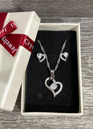 Подарунок дівчині - набір "срібні сердечки з цирконами" кольє та сережки пусети ювелірний сплав у коробочці3 фото