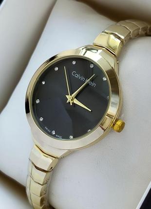 Наручний годинник на тонкому браслеті для дівчат, золотистий колір, чорний циферблат3 фото