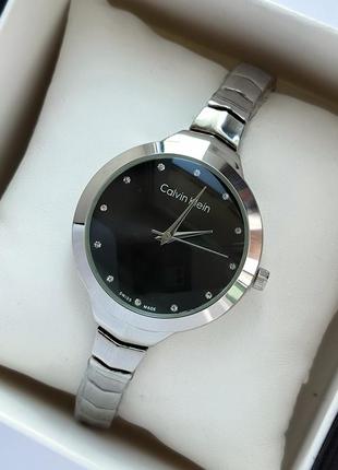 Сріблястий жіночий наручний годинник з чорним циферблатом, тоненький браслет