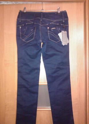 Новые джинсы красивого синего цвета2 фото