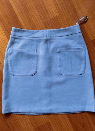 Міні-спідниця блакитного кольору з накладними кишенями  розмір s