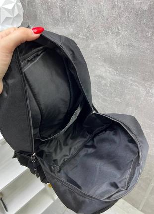 Черный практичный стильный вместительный рюкзак со светоотражателем8 фото