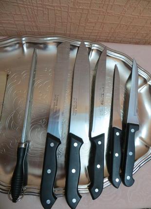 Набор ножей  на  деревяной подставке2 фото