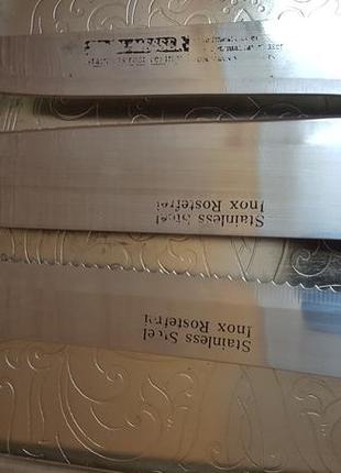 Набор ножей  на  деревяной подставке5 фото