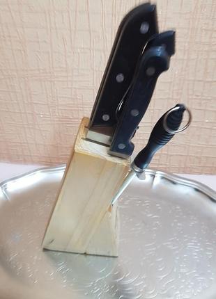 Набор ножей  на  деревяной подставке7 фото