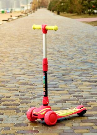 Дитячий складний триколісний самокат sport kids 2586 зі світними колесами підніжка 32х13 см малиново-лимонний1 фото