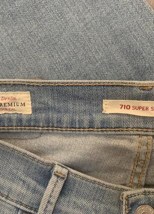 Джинсы levi’s скини голубые размер w25 l307 фото