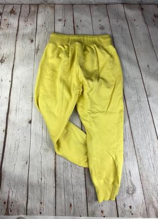 Спортивные штаны женские джоггеры champion желтого цвета теплые флисовые4 фото