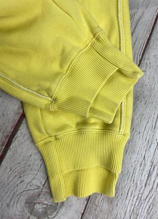 Спортивные штаны женские джоггеры champion желтого цвета теплые флисовые7 фото
