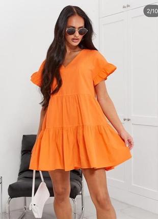 Оранжевое платье свободного кроя1 фото