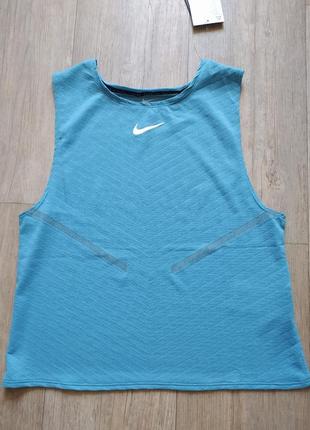 Футболка майка для бега nike dri fit adv run division
engineered tank новая оригинал4 фото