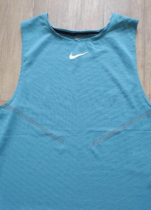 Футболка майка для бега nike dri fit adv run division
engineered tank новая оригинал6 фото