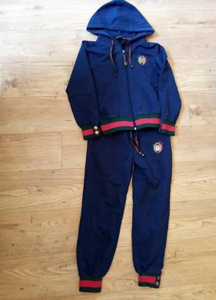 Костюм для ребенка темно синего цвета