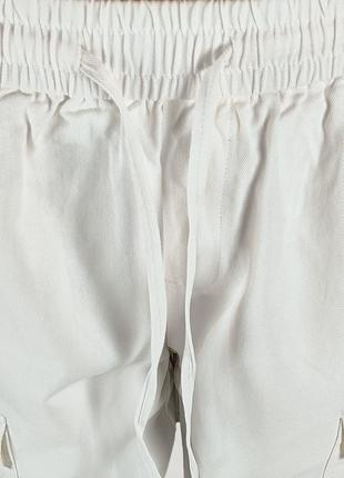 Свободные штаны карго на резинке молочные.4 фото