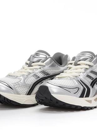 Женские кроссовки серебристыеasics gel-kayano 148 фото