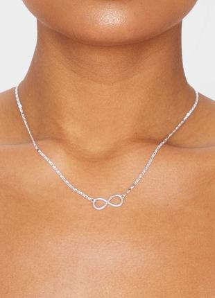 Цепочка коротенькая тоненькая со знаком бесконечности золотая plt