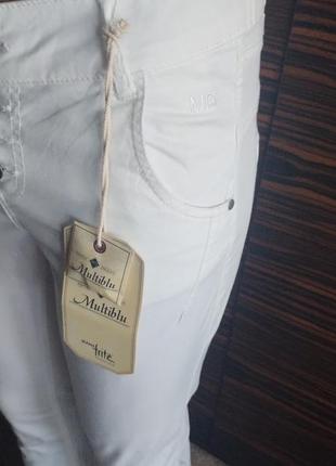 Женские белые джинсы бренда multiblu!5 фото