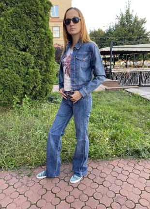 Костюм джинсовий трансформер жіночий синій із потертостями куртка + джинси