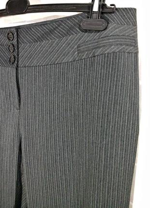 Модні смугасті штани з широким поясом6 фото