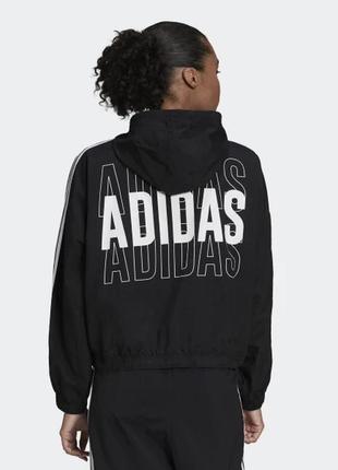 Жіноча вітровка adidas essentials hc91602 фото