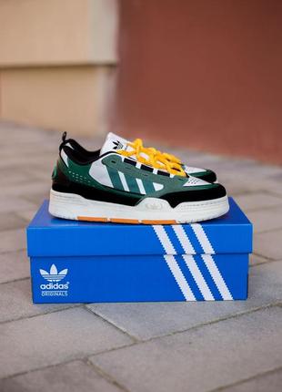 Чоловічі кросівки зелені з помаранчевим adidas adi2000