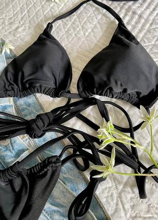 Черный женский купальник на завязках с трусиками бразильянами10 фото