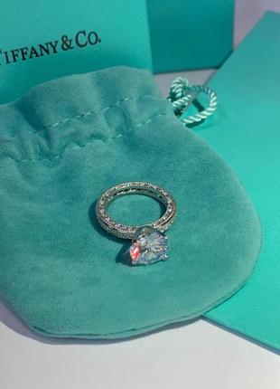 Кольцо в тиффани tiffany, серебро 925 пробы. крупный циркон и мелкие цирконы по ребру кольца.4 фото