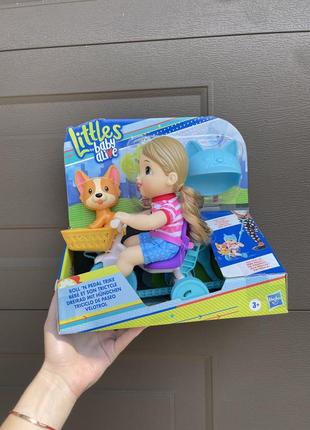 Дівчинка на велосипеді littles by baby alive