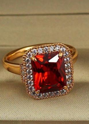 Кольцо xuping jewelry авангард с красным камнем р 16  золотистое1 фото