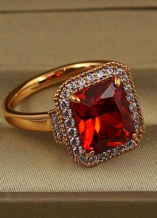 Кольцо xuping jewelry авангард с красным камнем р 17  золотистое2 фото