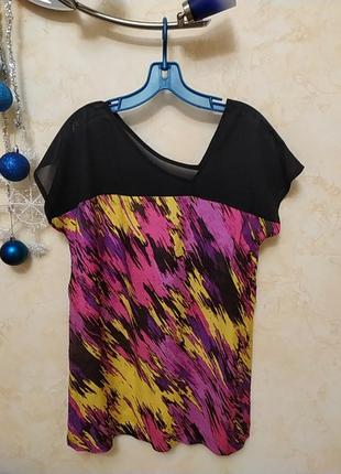 Туніка ,блуза ,футболка з асиметричним вирізом.
