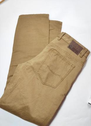 Джинсы мужские брюки прямого кроя коричневого цвета от бренда canda thermo w30/l324 фото